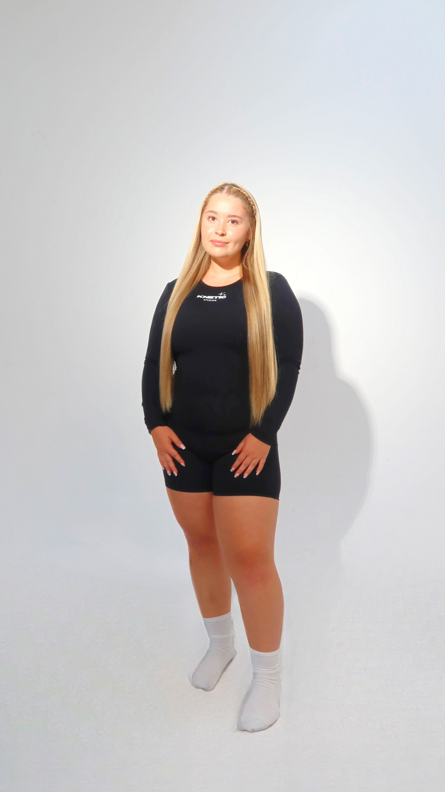 LONG SLEEVE ROMPER: CUTOUT OPEN BACK & CINCHED BOTTOM